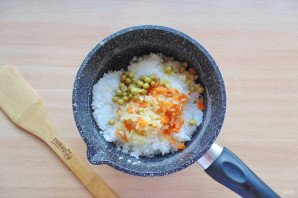 Морской окунь с рисом в духовке