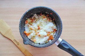 Морской окунь с рисом в духовке